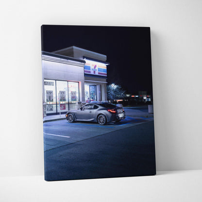 Toyota GR86 parked outside convenience store at night canvas wall art print.