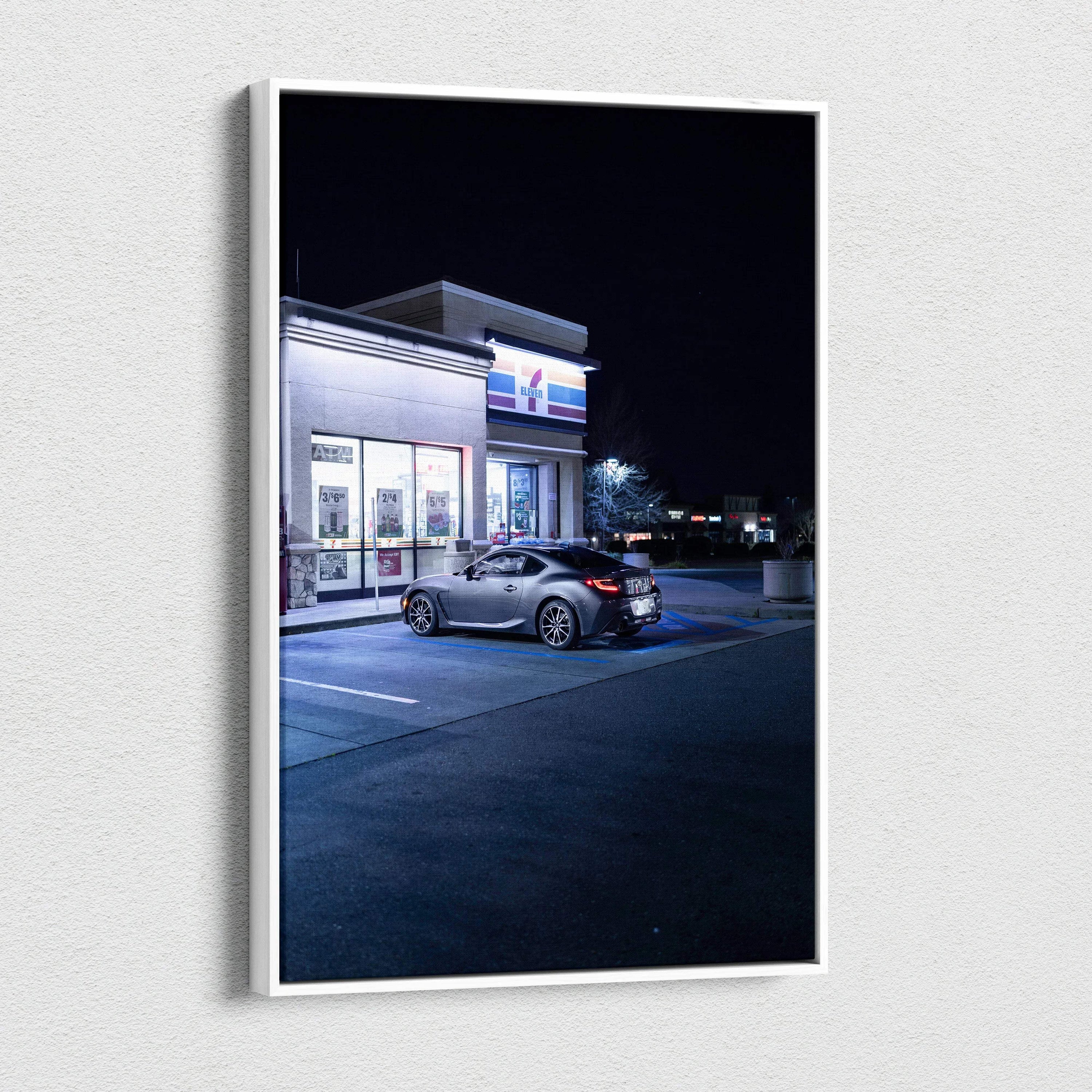 Toyota GR86 parked outside a lit convenience store at night canvas wall art print.