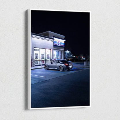 Toyota GR86 parked outside a lit convenience store at night canvas wall art print.