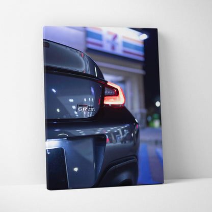 Toyota GR86 rear close-up at night canvas wall art with vibrant lighting and glossy finish.