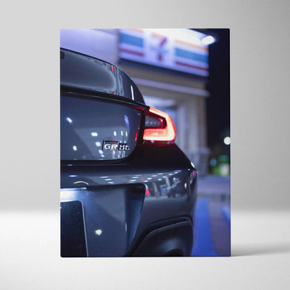 Toyota GR86 close-up rear view canvas art with illuminated taillight, vertical wall art print.