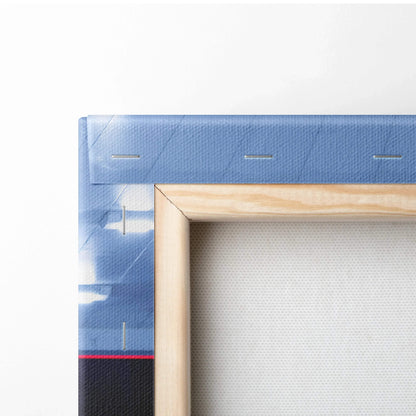 Close-up of wooden frame and canvas texture showing canvas art corner with blue and red details for wall art display.