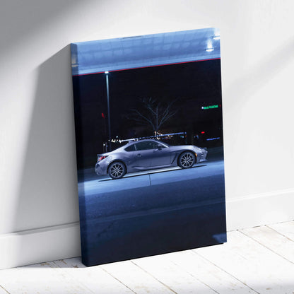 Toyota GR86 parked at night urban scene canvas wall art with vertical layout and museum quality print.