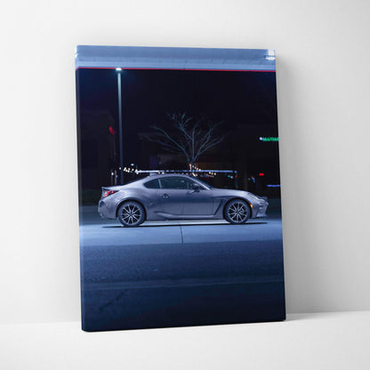 Toyota GR86 silver sports car at night featured on vertical canvas wall art.