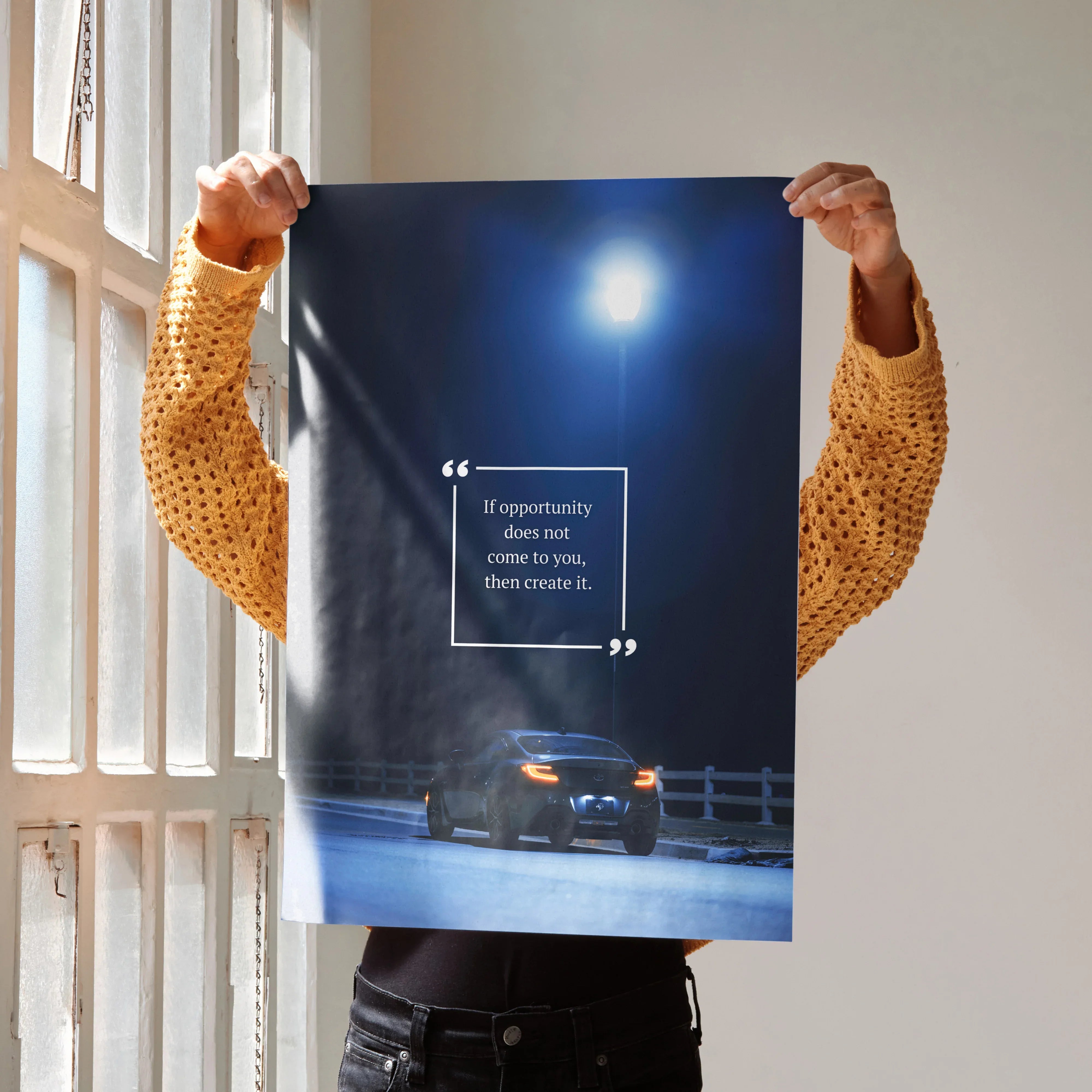 Toyota GR86 parked on a road at night with motivational text poster wall art.