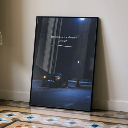 Toyota GR86 poster with car at night and motivational text "Stay focused and never give up" wall art.