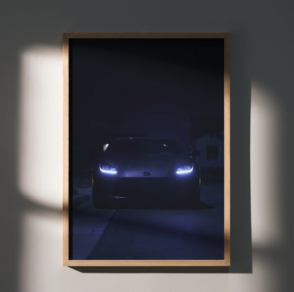 GR86 automotive art poster with dark, moody lighting and glowing headlights wall art.