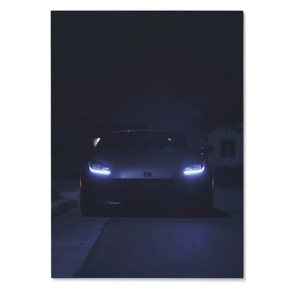 Dark automotive poster featuring Toyota GR86 front view with glowing headlights, wall art design.