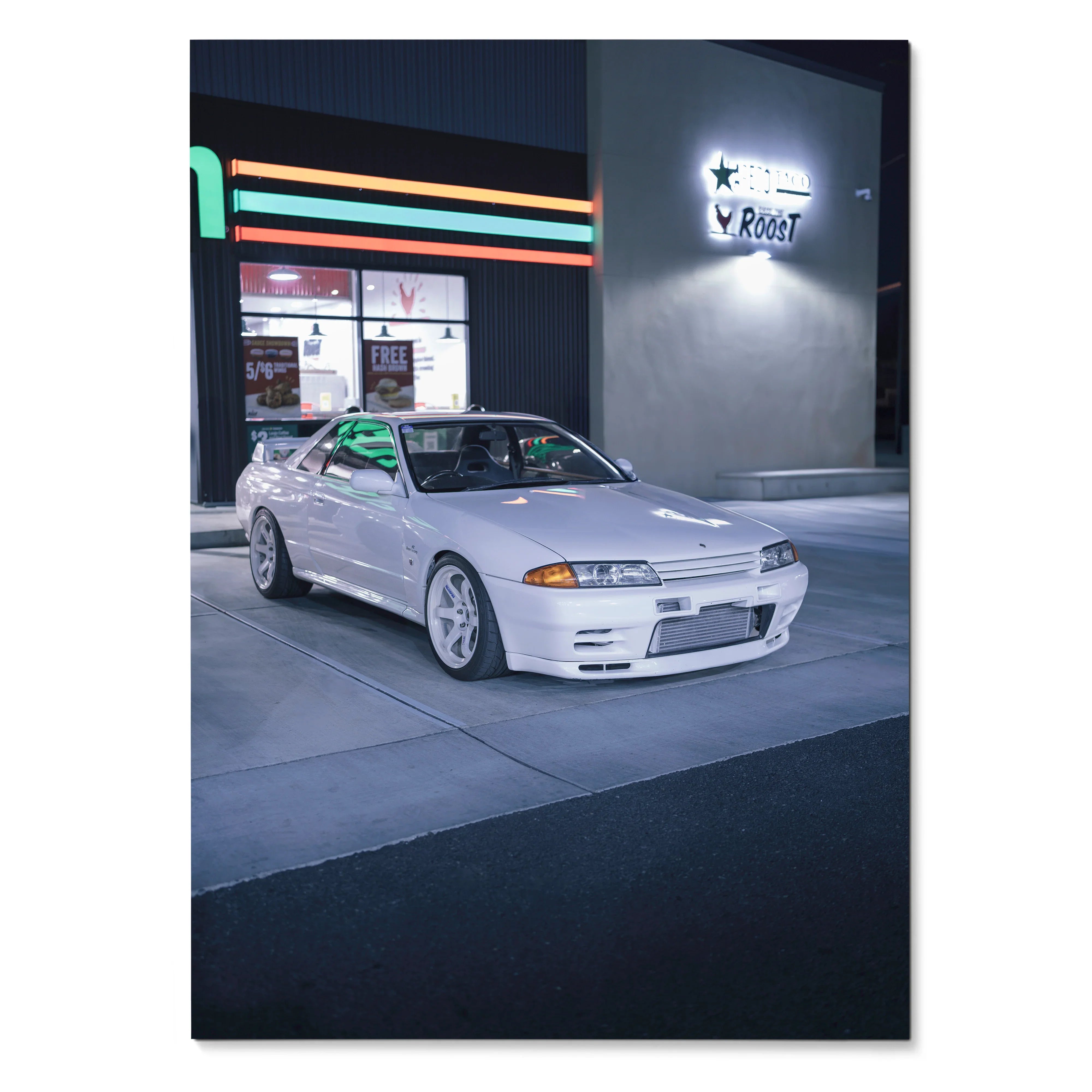 Nissan GTR R32 Skyline parked outside lit vintage gas station poster wall art.