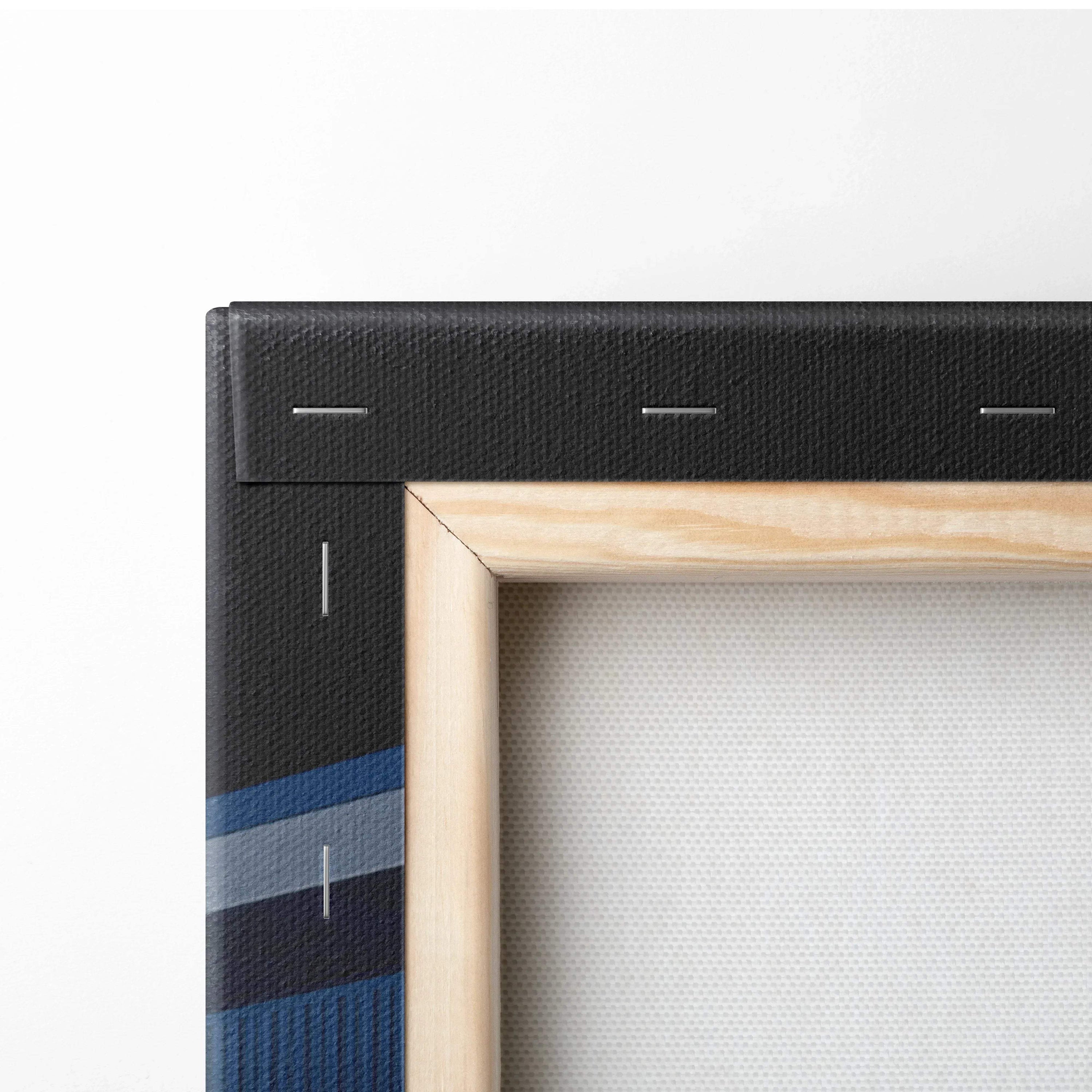 Close-up of Nissan GTR R34 Skyline canvas wall art corner with black and blue design and wooden frame.