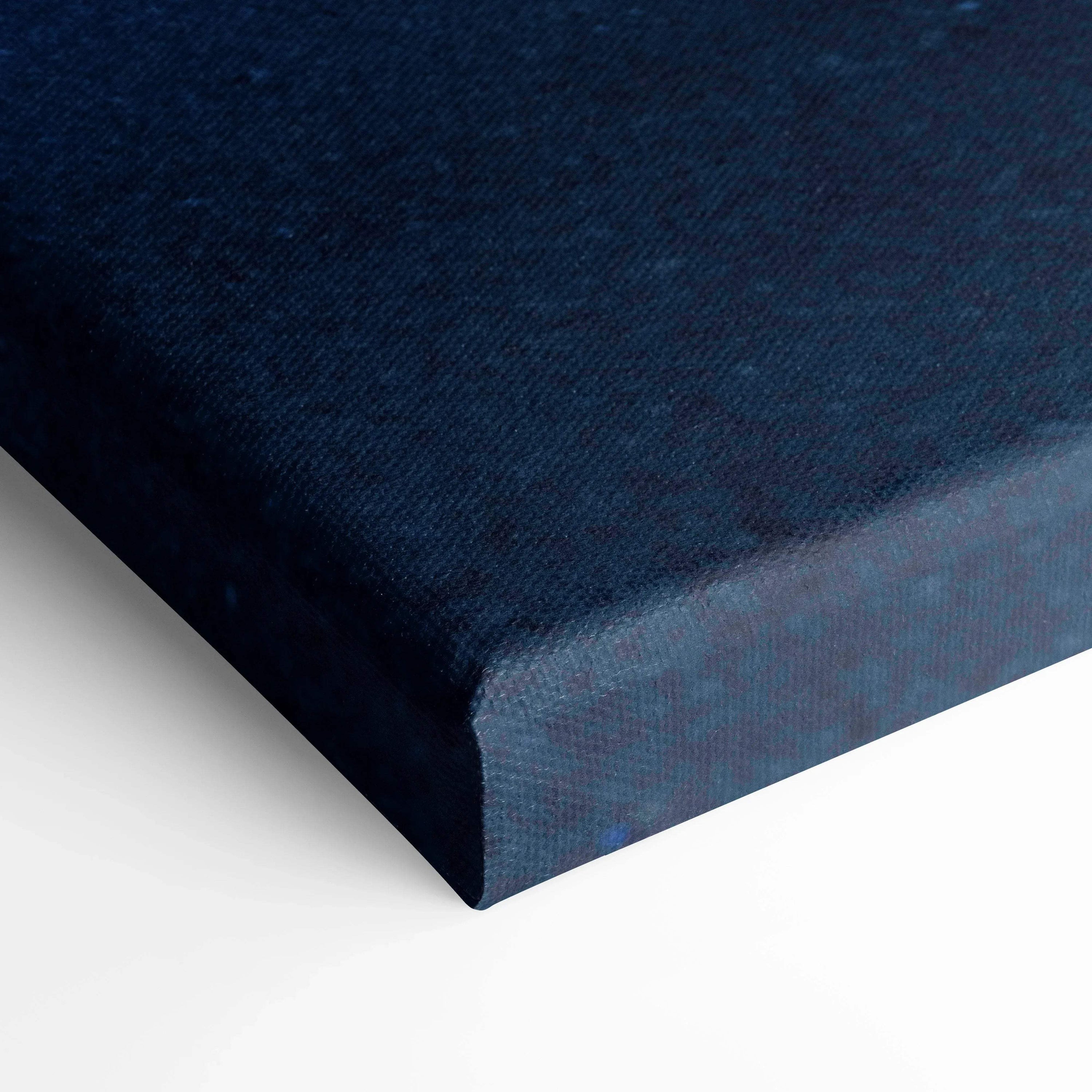 Close-up of navy blue textured canvas corner showcasing thick gallery-wrapped wall art canvas print.