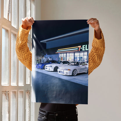 Nissan GTR R32 and R34 Skyline parked outside 7-Eleven at night poster wall art.