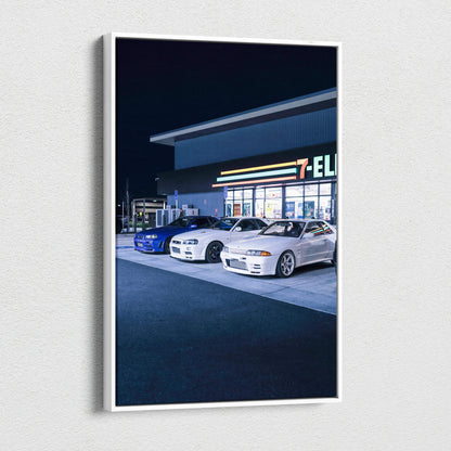 Vertical canvas art featuring Nissan GTR R34 Skyline cars parked outside a 7-Eleven at night wall art.