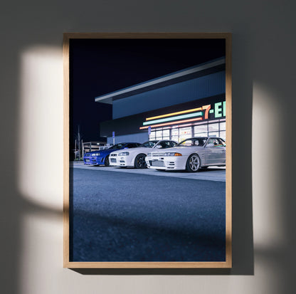 Nissan GTR Skyline R32 and R34 cars parked at night poster wall art in wooden frame.