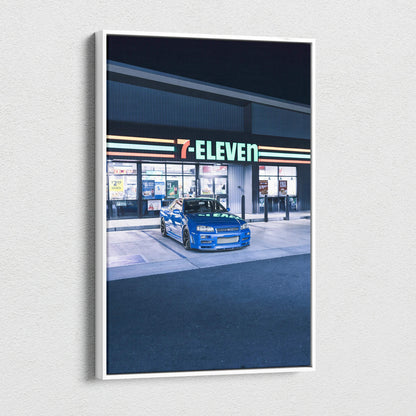 Vertical canvas art of blue Nissan GTR R34 Skyline parked at a 7-Eleven store at night wall art.