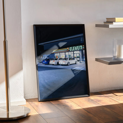 Nissan GTR Skyline R32 and R34 poster with night city street and 7-Eleven wall art in black frame.