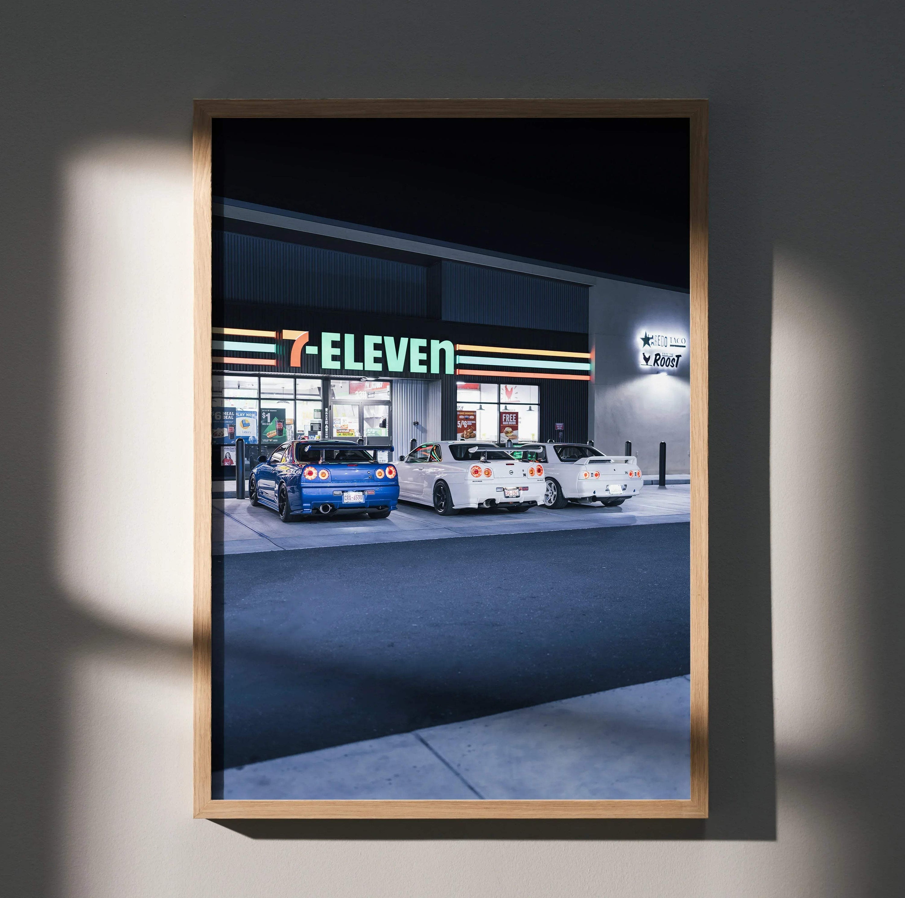 Nissan GTR R32 and R34 Skyline poster featuring detailed night scene at 7-Eleven, automotive wall art.