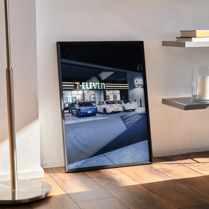 Nissan R32 and R34 Skyline GTR poster showing blue and white cars in front of 7-Eleven, automotive wall art.