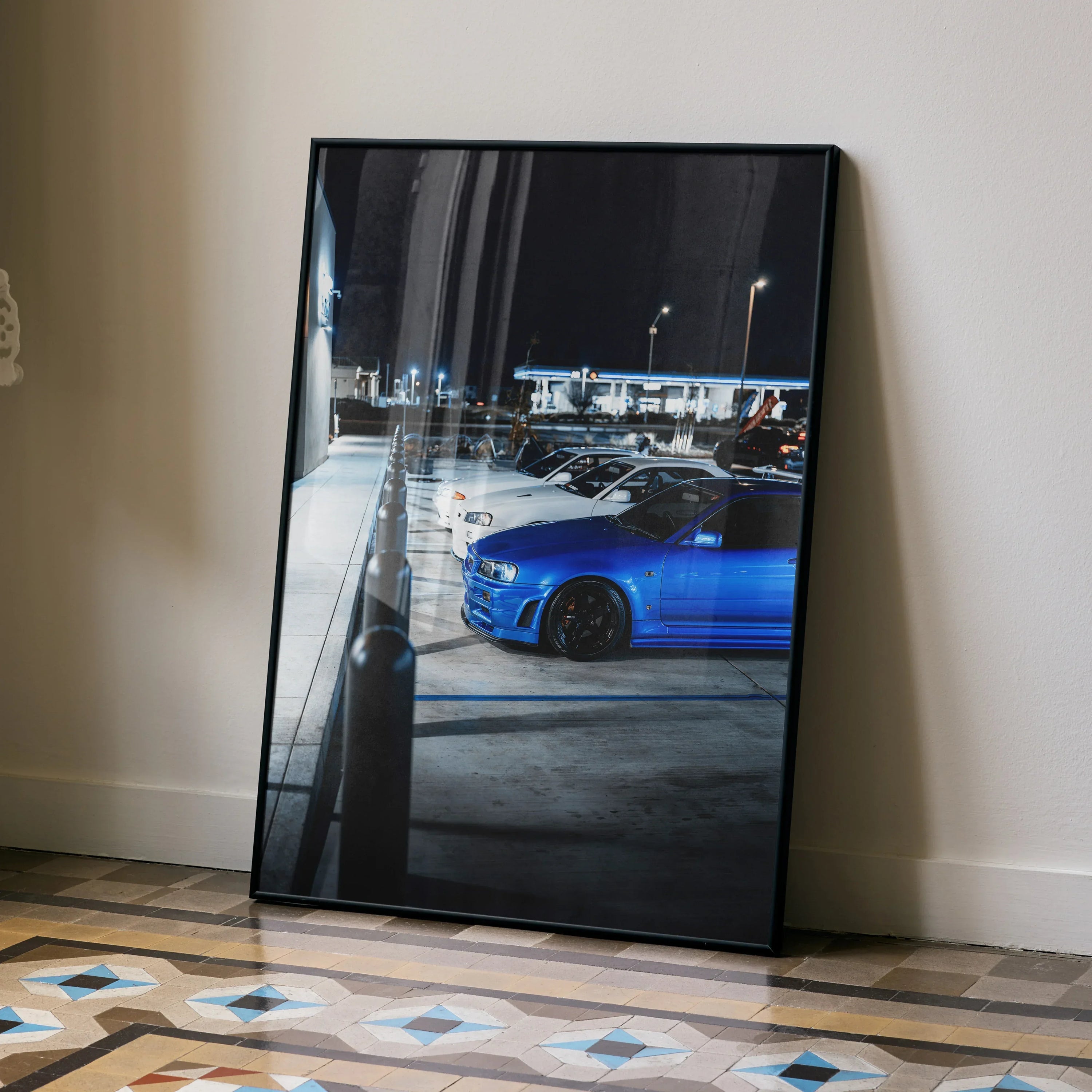 Nissan GTR Skyline Legends Poster featuring blue R32 and R34 GTRs parked at night, automotive wall art.