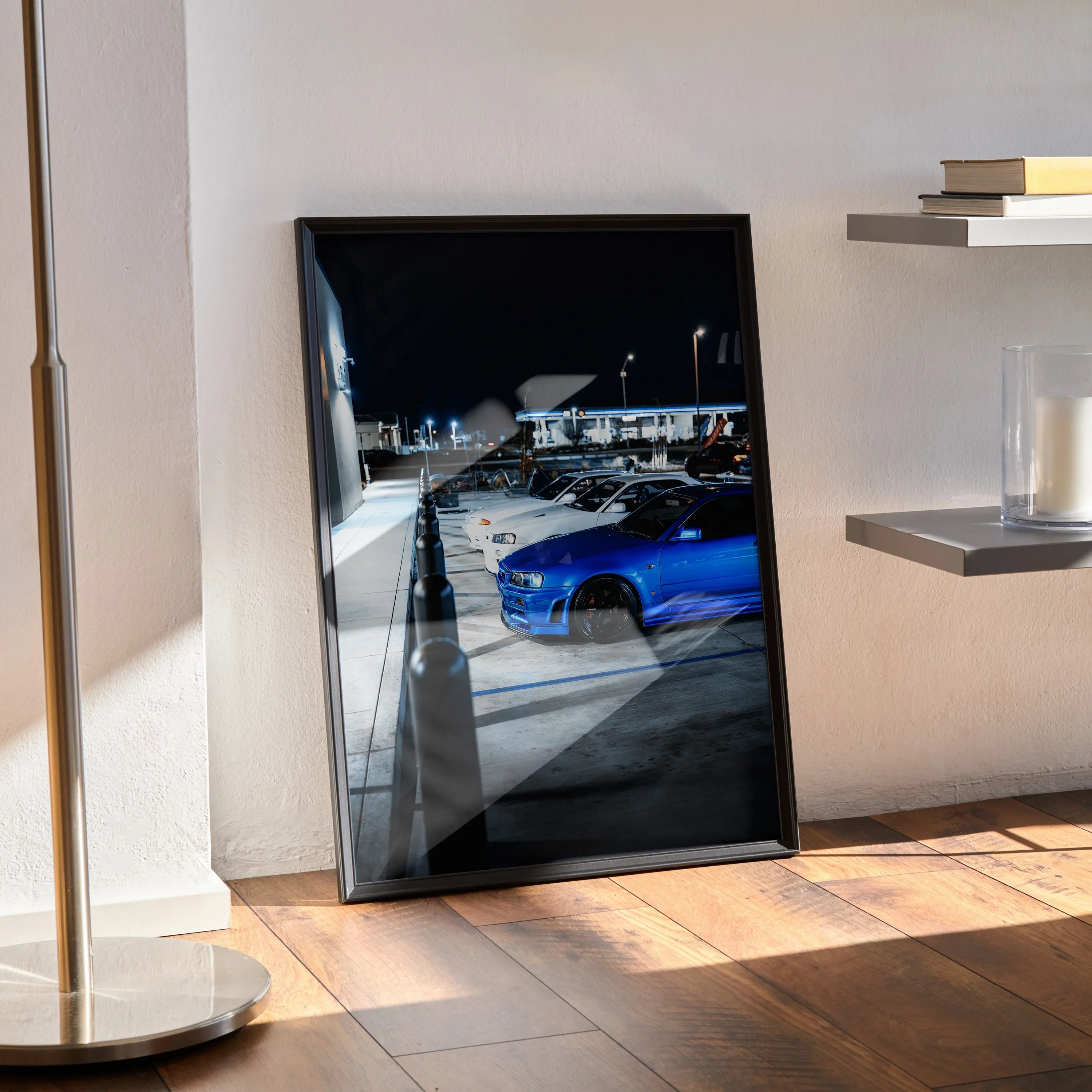 Framed Nissan GTR Skyline Legends Poster featuring blue R32 and R34 models parked at night, modern wall art.