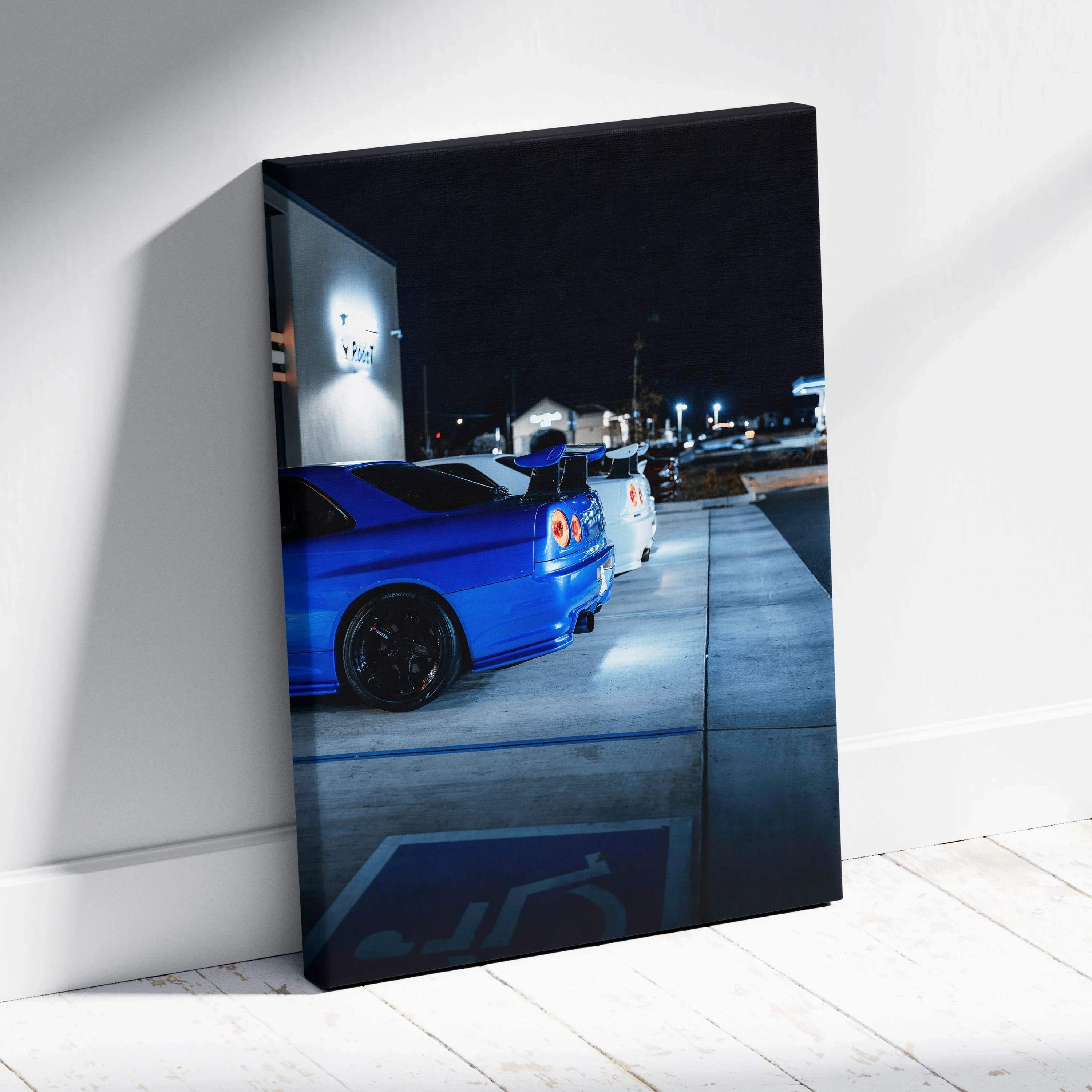 Blue Nissan GTR R34 skyline car at night on vertical canvas wall art print.