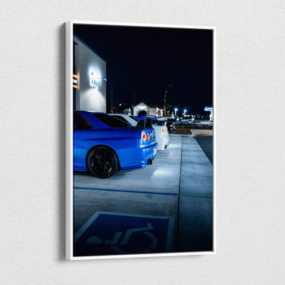 Vertical canvas art featuring a blue Nissan GTR R34 Skyline parked at night, high-resolution wall art.
