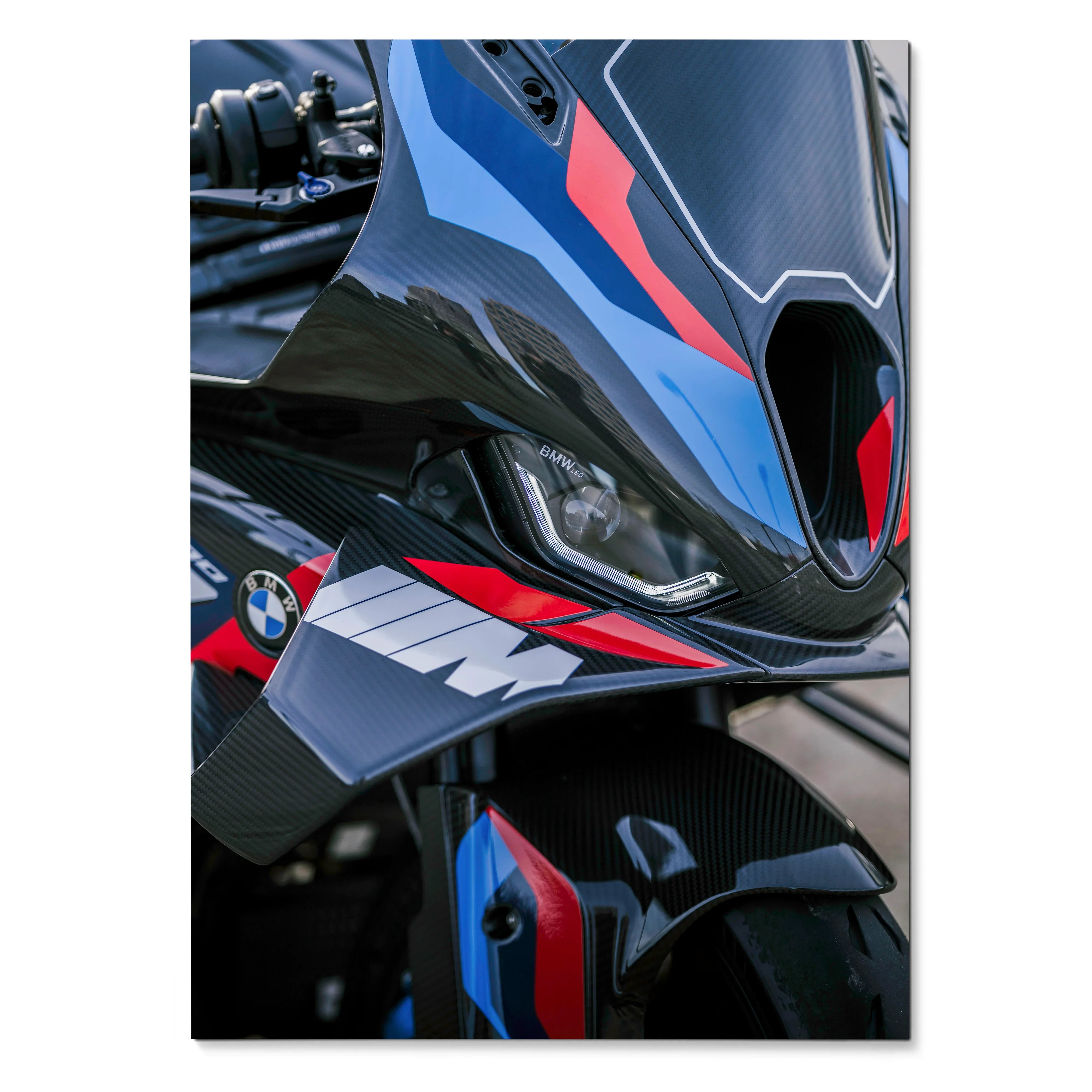 BMW M1000RR close-up motorcycle poster featuring sleek black, blue, and red fairing details wall art.