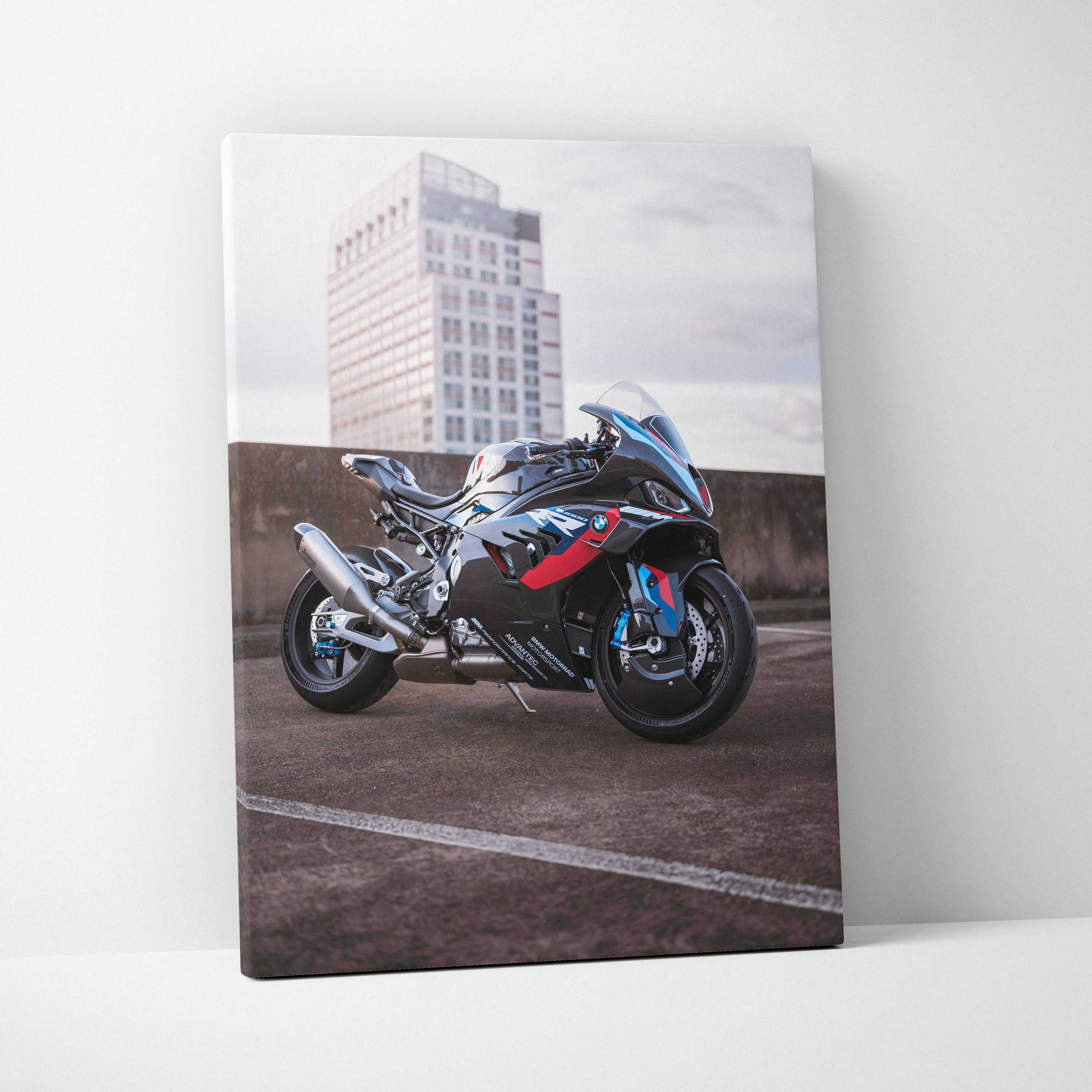 BMW M1000RR sport motorcycle canvas wall art with cityscape background, vertical canvas print.