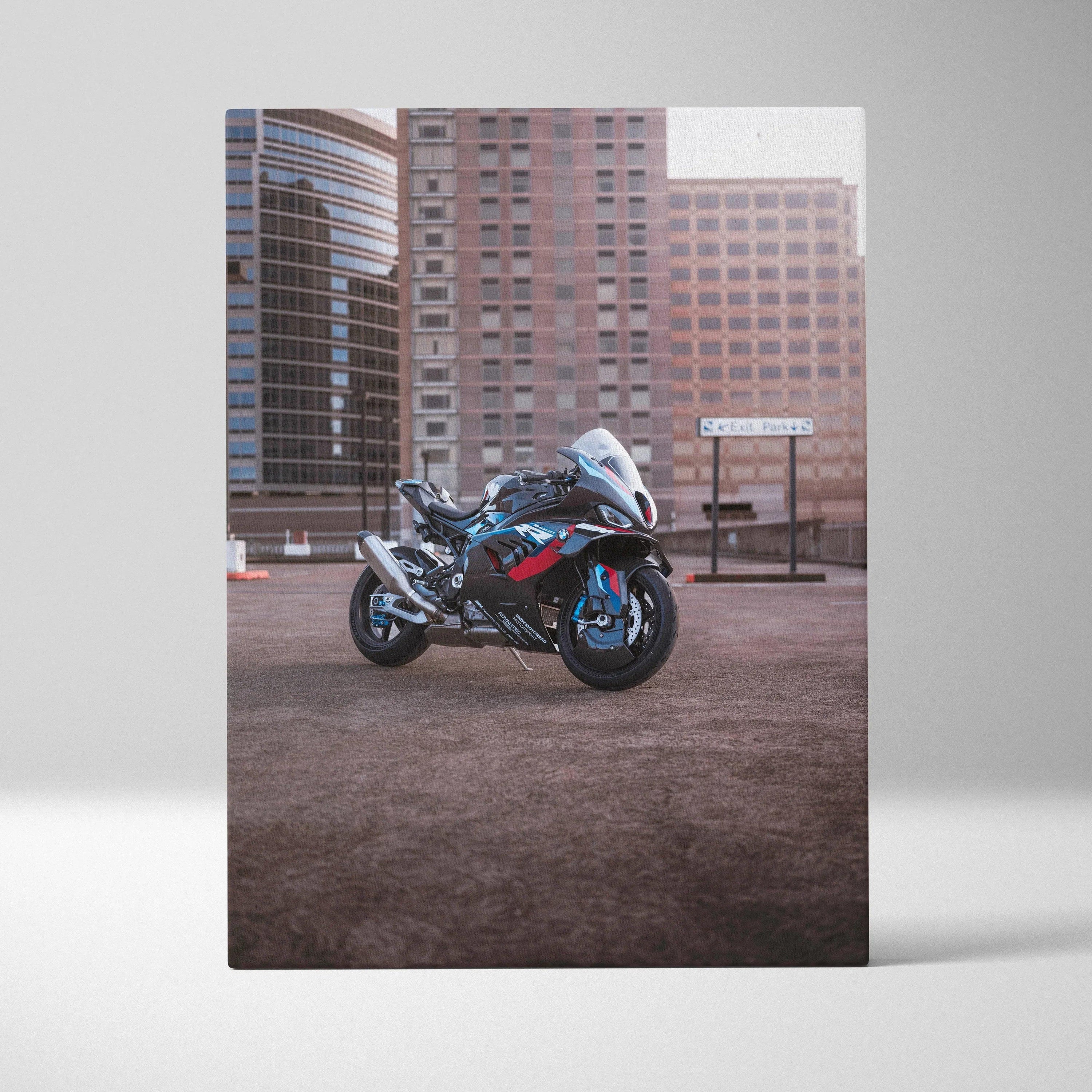 BMW M1000RR motorcycle canvas art with urban skyline background, vertical wall art print.
