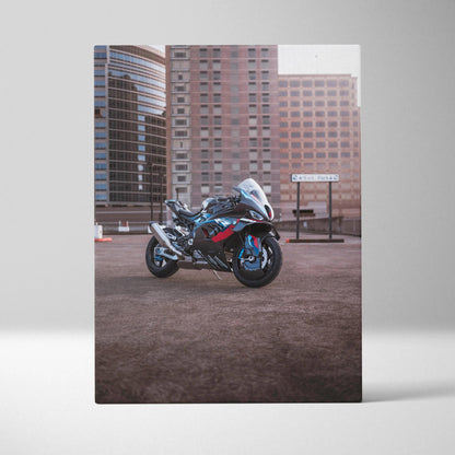 BMW M1000RR motorcycle canvas art with urban skyline background, vertical wall art print.