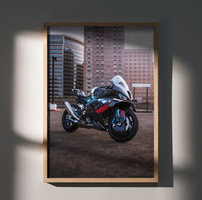 BMW M1000RR motorcycle poster wall art with cityscape background in modern frame.