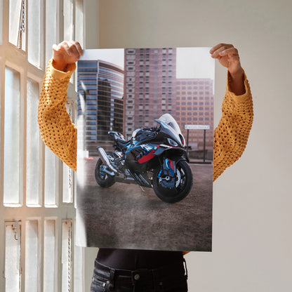 BMW M1000RR motorcycle poster wall art featuring a sleek bike against city buildings.