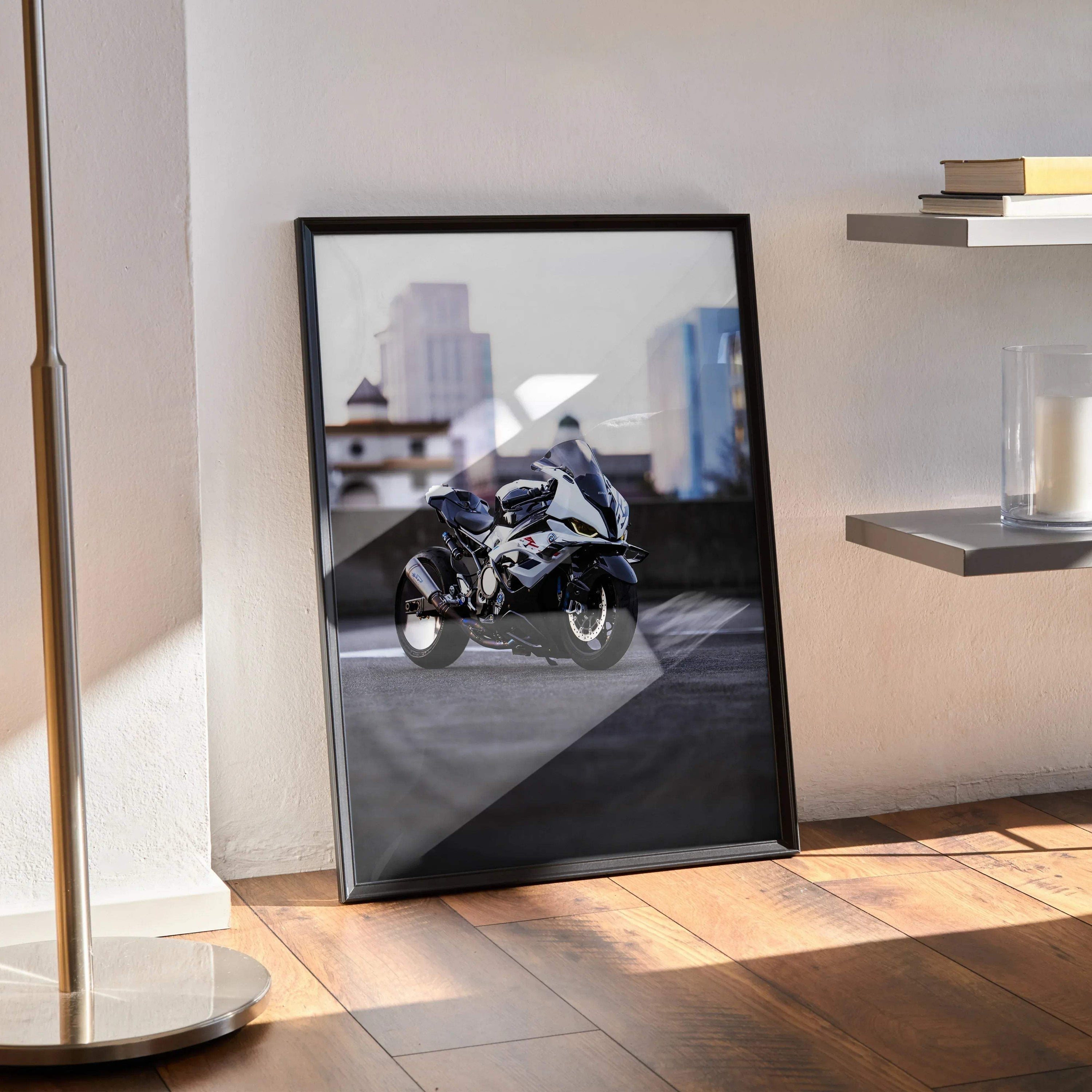 BMW S1000RR drag spec motorcycle poster in black frame leaning on wall, modern urban backdrop wall art.