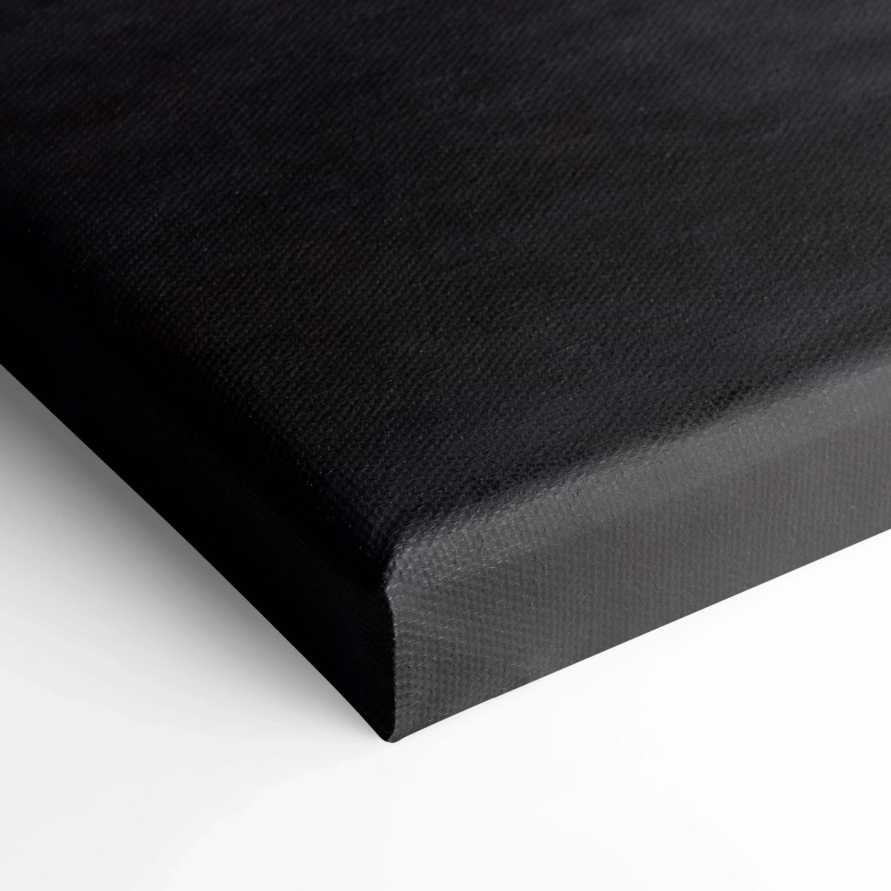 Black wrapped canvas corner showcasing museum-quality texture for wall art and canvas art display.