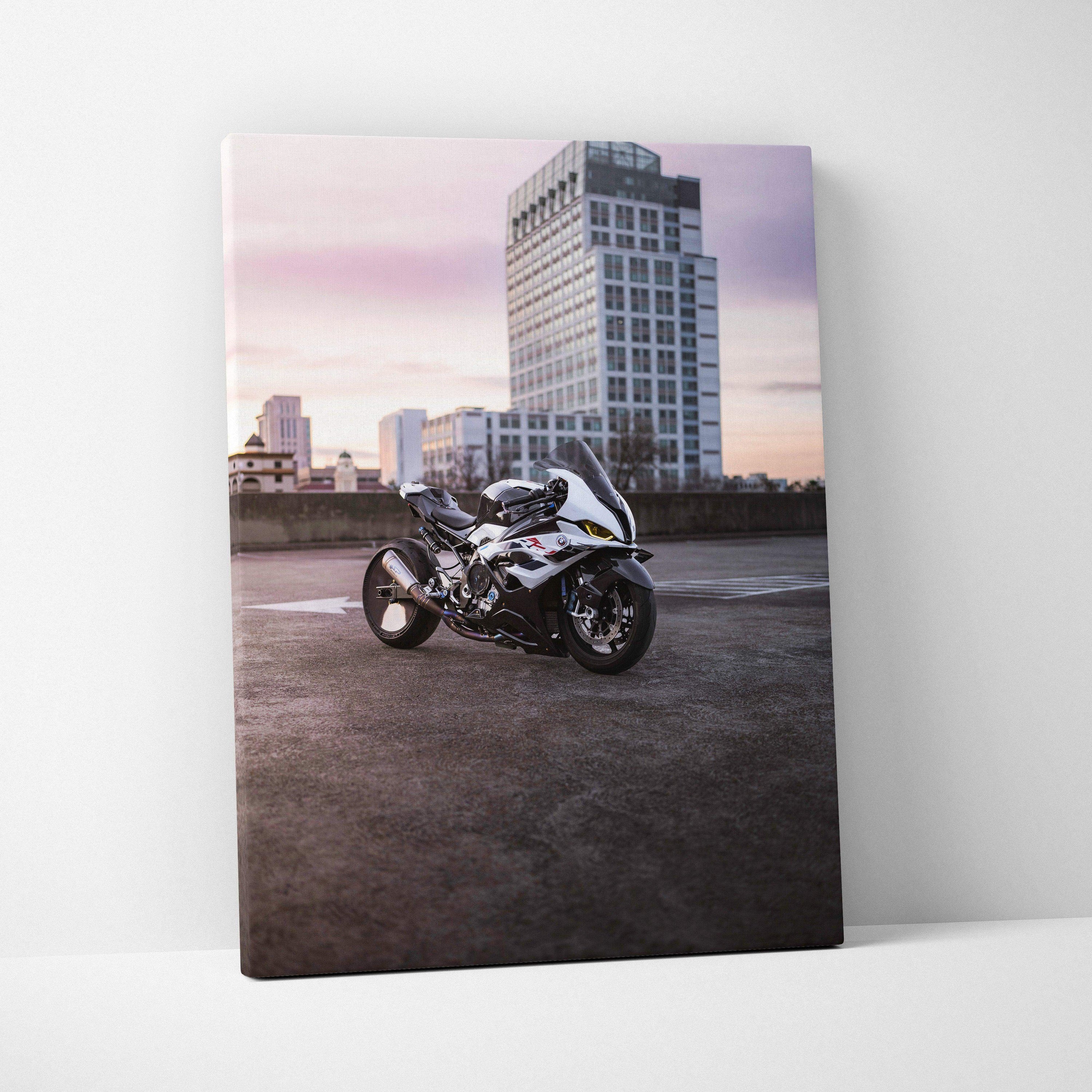 BMW S1000RR motorcycle on rooftop against cityscape dusk sky, vertical canvas wall art.