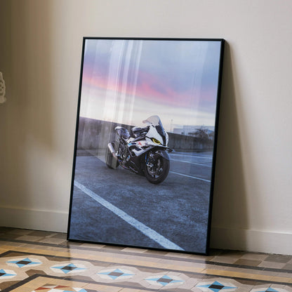 BMW S1000RR drag spec motorcycle poster leaning against wall with sunset background, modern wall art.
