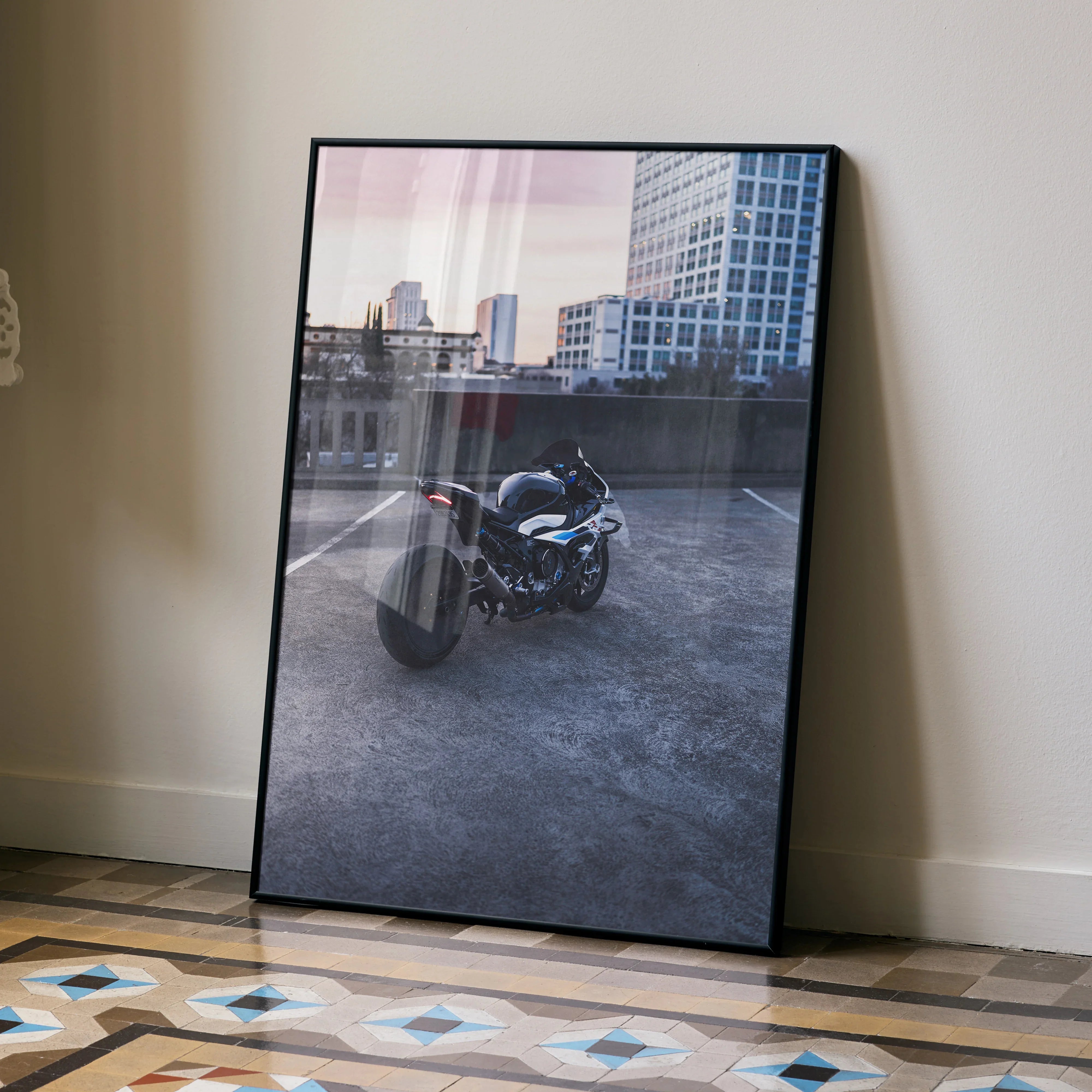 S1000RR Drag Spec motorcycle poster leaning against wall on tiled floor, urban city background wall art.