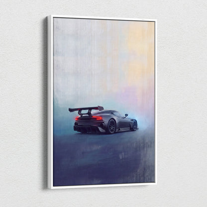 Auston martin vulcan inspired canvas art featuring a sleek dark gray racing car with rear spoiler in a white frame