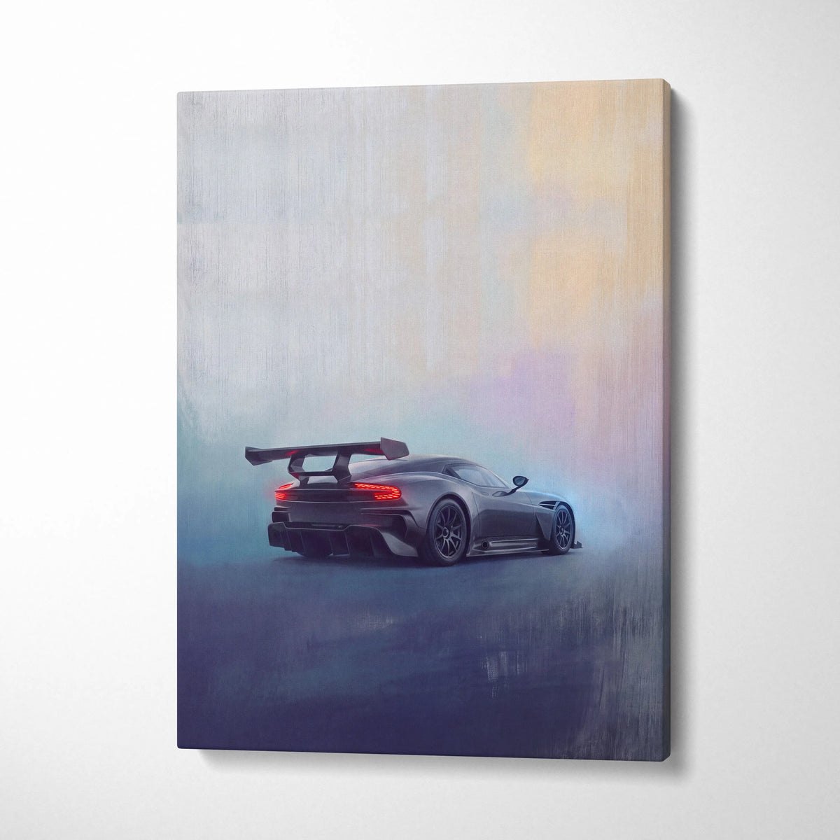 Aston Martin Vulcan inspired premium canvas art featuring a sleek black sports car rear view with glowing red taillights