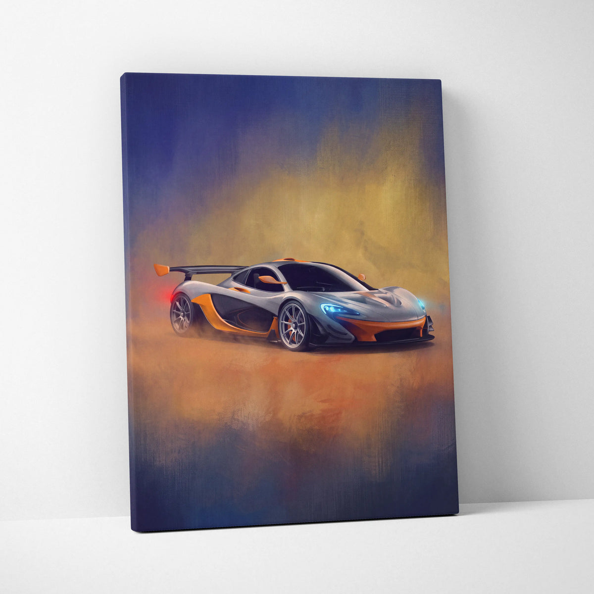 A vibrant canvas print of a silver and orange McLaren P1 with glowing blue headlights on a gradient background
