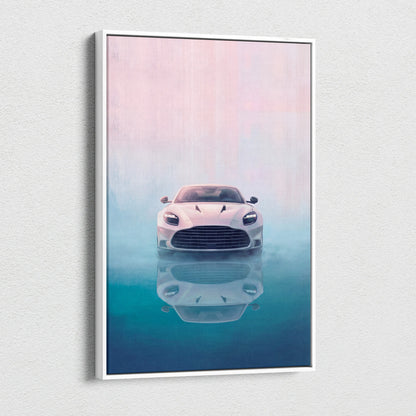 A framed canvas print of a white Aston Martin sports car with its reflection on misty blue water and a pink teal background