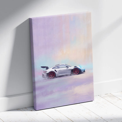A canvas print of a white porsche 911 gt3 with red wheels drifting against a soft pastel sky track edition