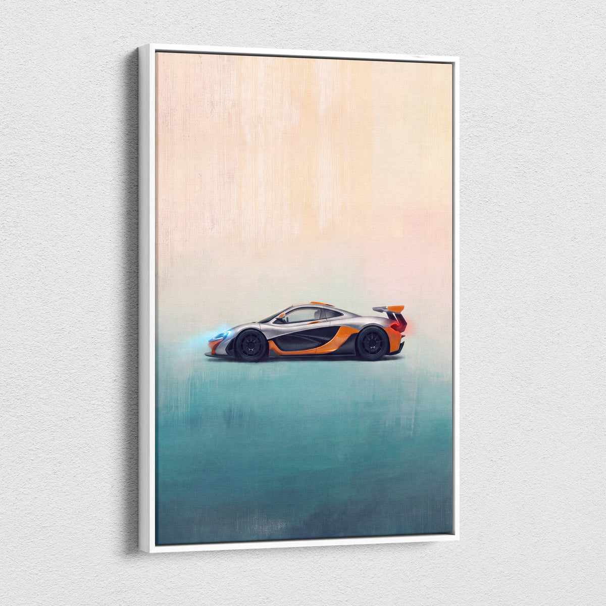Silver and orange mclaren p1 sports car canvas print in a white frame inspired automotive wall art luxury supercar
