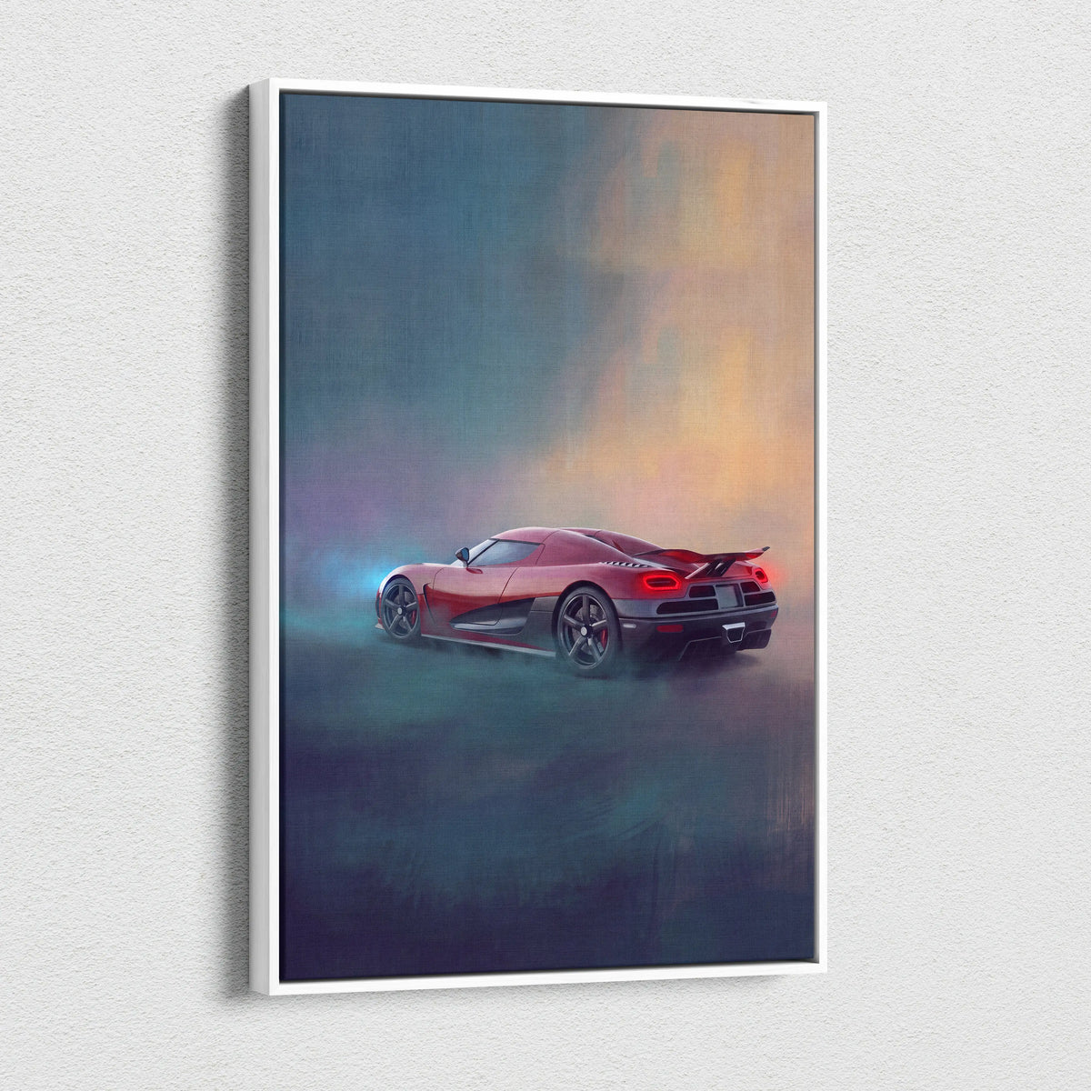 A framed canvas print of a red Koenigsegg Agera inspired hypercar with glowing taillights against a gradient sky
