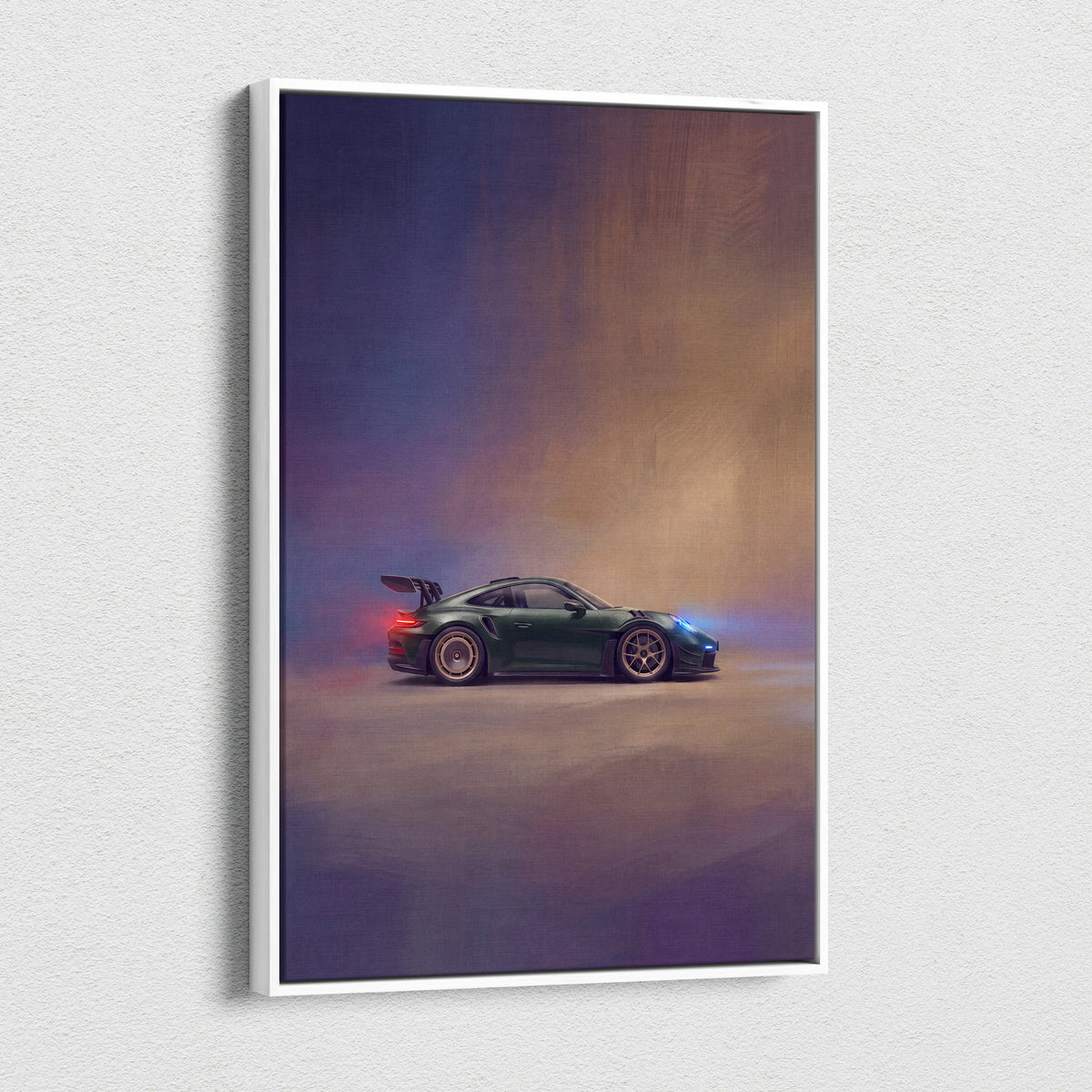 A framed canvas print of a dark green Porsche 911 GT3 RS with glowing lights on a moody gradient background