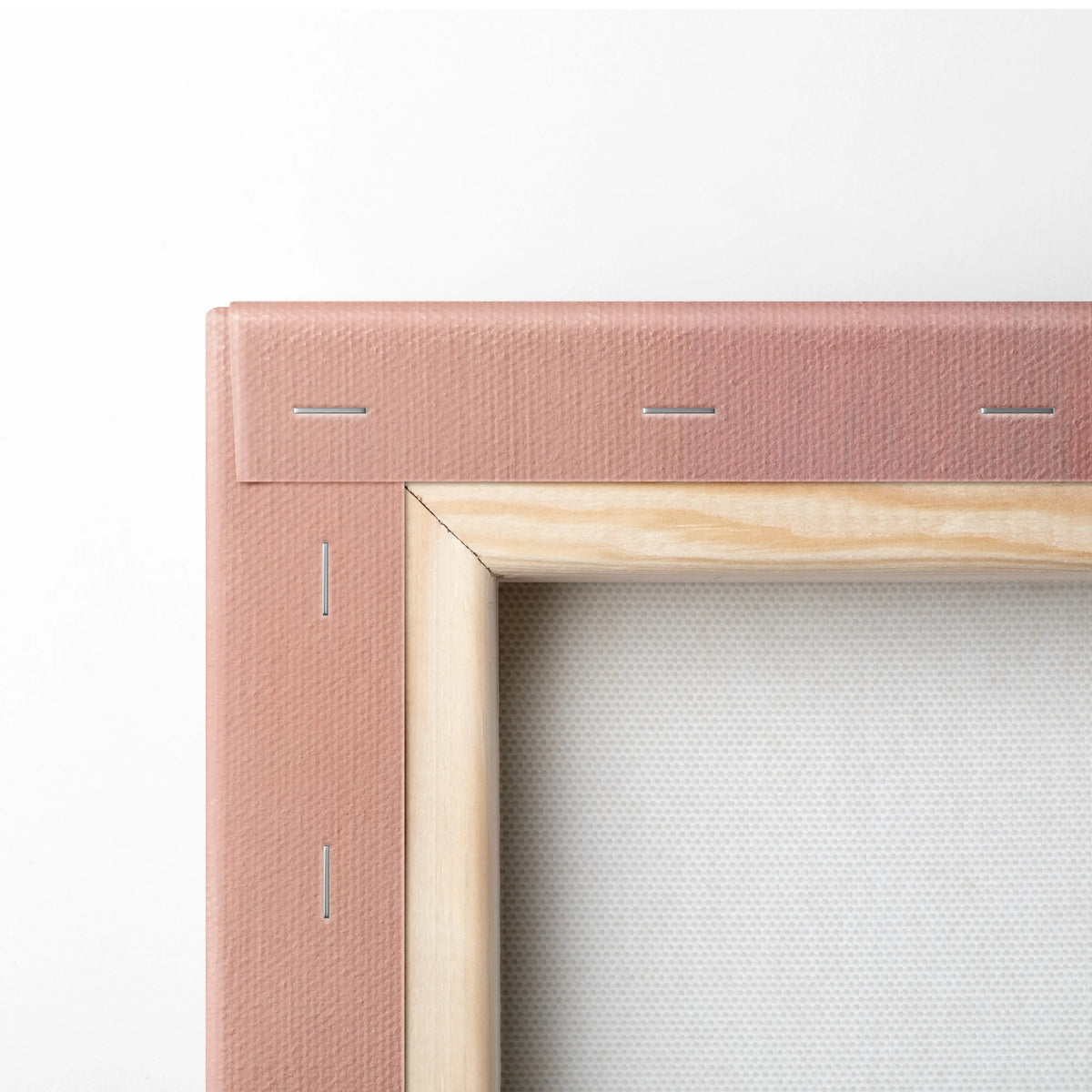 A blush pink textured fabric canvas frame with visible stitching and light wood border for porsche 911 gt3 rs wall art