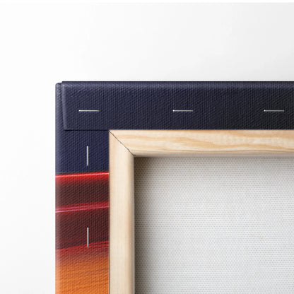 Close-up of wooden frame and stretched canvas with dark blue, red, and orange abstract digital art pattern on fabric edge.