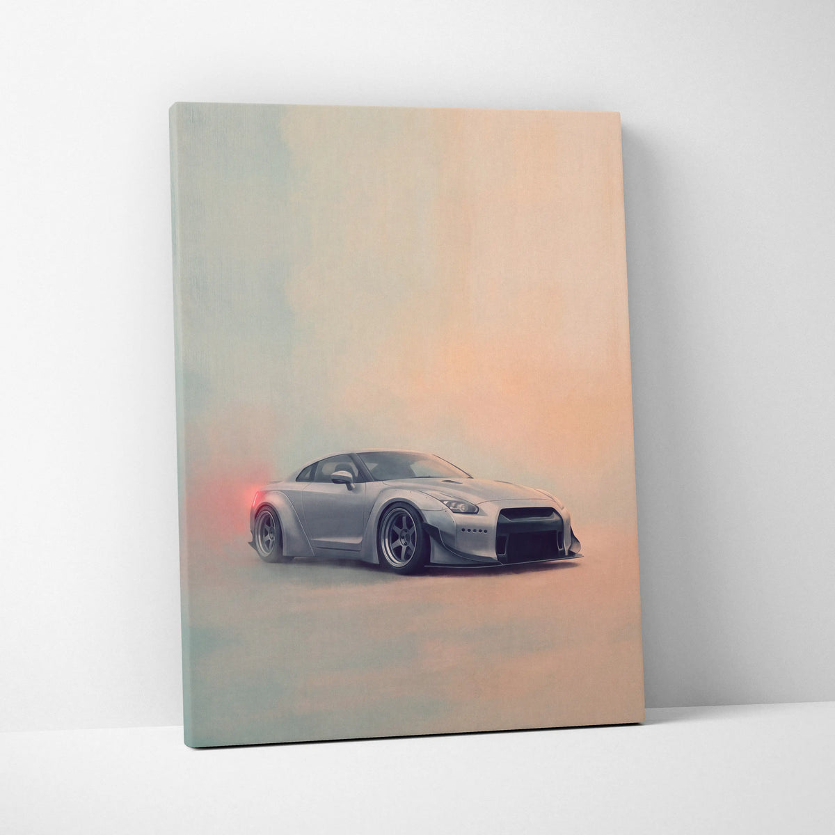 Silver Nissan GT-R inspired canvas art featuring a sleek modified sports car with black rims and red rear lights