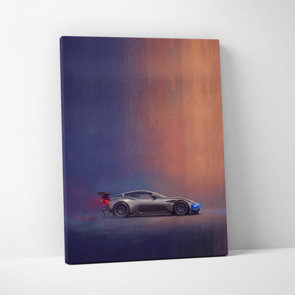 A sleek silver Aston Martin Vulcan inspired racing car on a canvas with dramatic gradient lighting track edition print