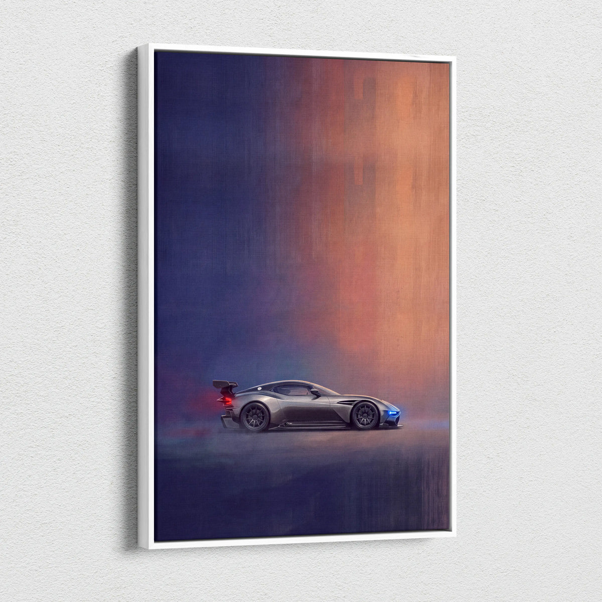 Aston Martin Vulcan inspired canvas painting print showcasing a sleek silver sports car with blue accents and spoiler